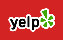 A red background with the yelp logo in black.